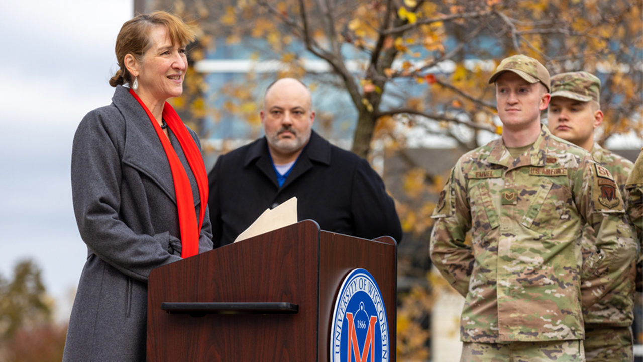 UW-Platteville Chancellor Tammy Evetovich and Greg Tremelling, coordinator of UW-Platteville Wright Center for Non-Traditional and Veteran Students during the Veterans Day observance on campus.