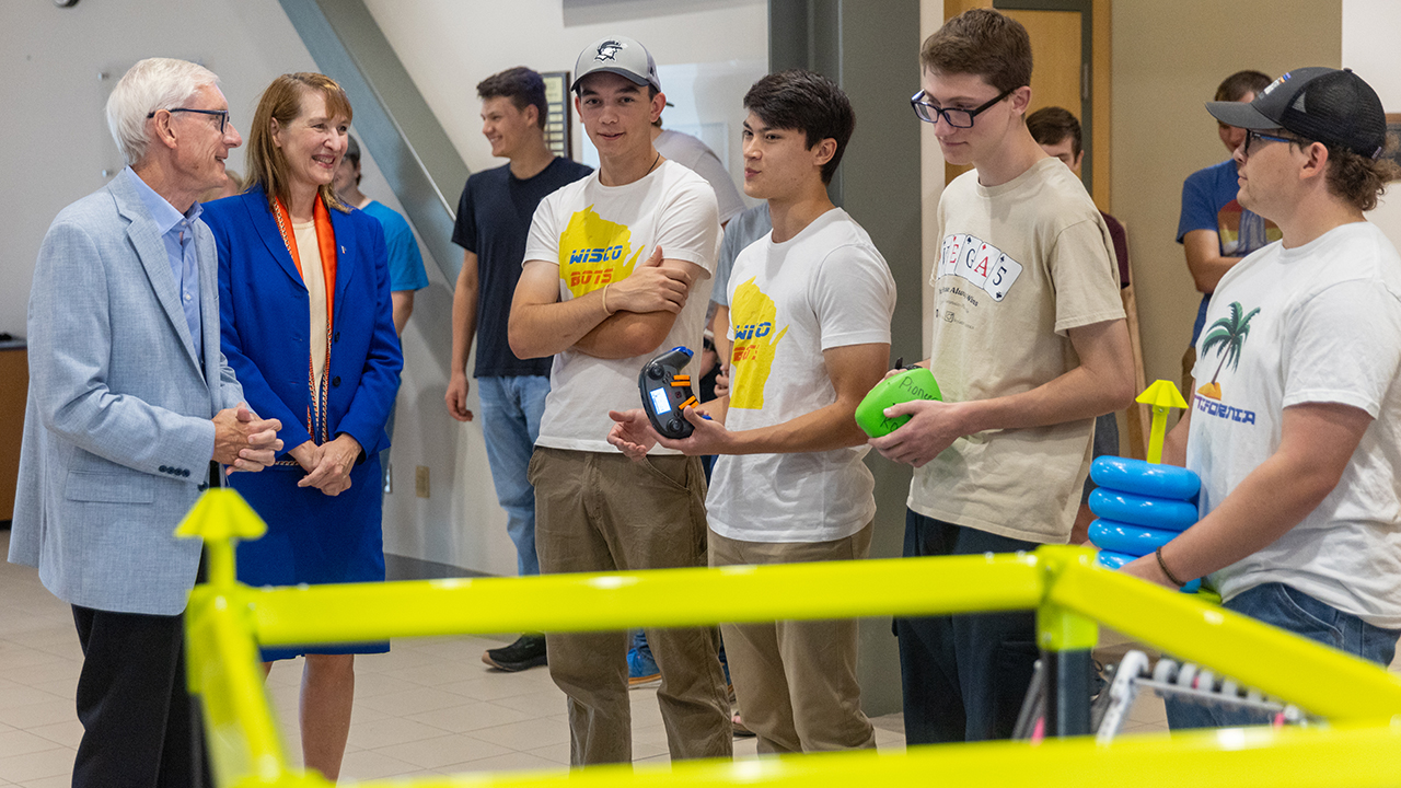 The student robotics team, WiscoBots, gives a demonstration in the VEX Arena.