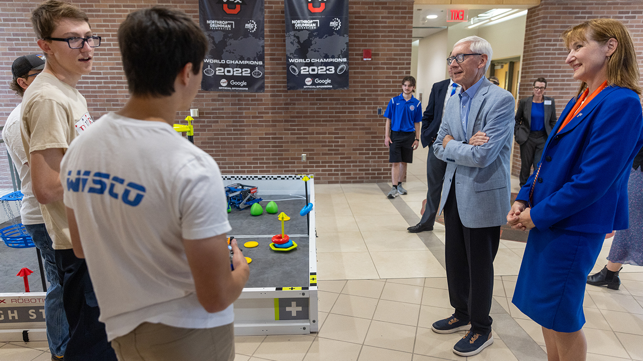 The student robotics team, WiscoBots, gives a demonstration in the VEX Arena.