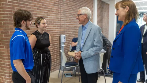 Governor Evers meets with students in Busby Hall of Engineering, where he toured the Cybersecurity Lab.