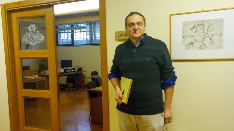 Andrey Ivanov stands outside of the Vatican Archives Room in Rome, Italy