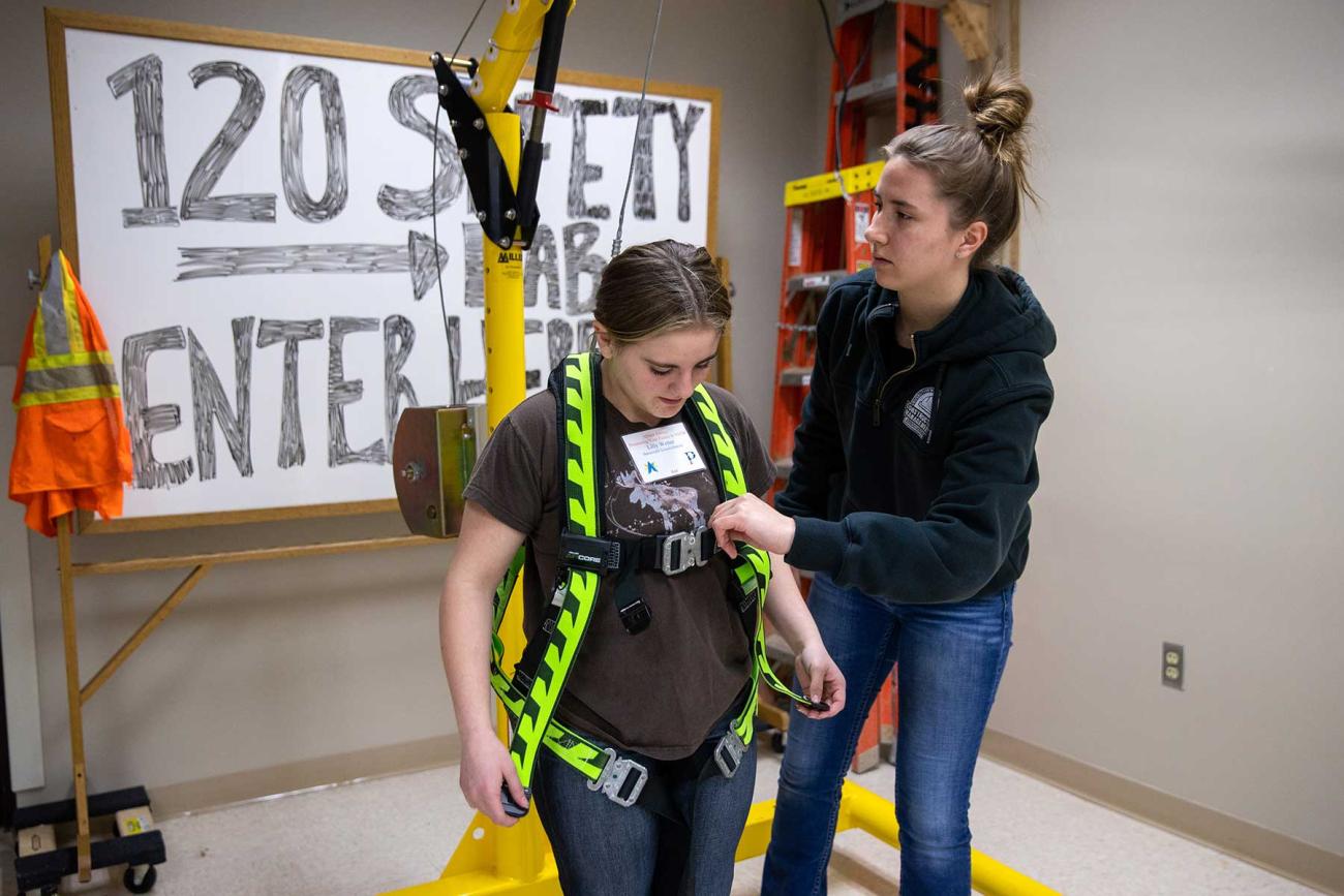 instructor explaining harness