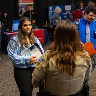 students speaking with cj professional