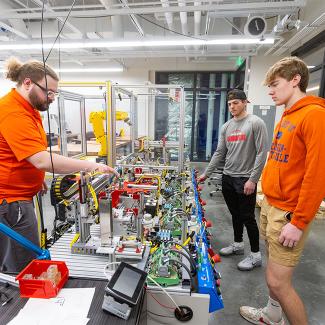 students working on assembly line