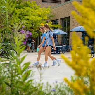 students walking on campus