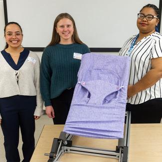 Taylor Nisius, Bryanne Pinkowski and JJ Hilliard pictured with their Gentle Jumps chair