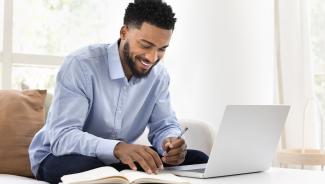 online student studying to advance his career