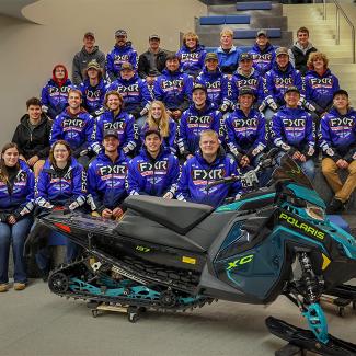 SAE club members with snowmobile