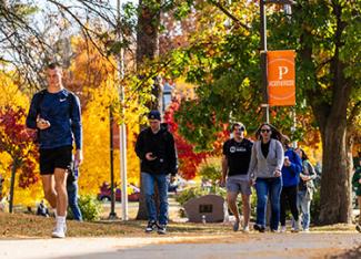 UW-Platteville students walking across campus in fall